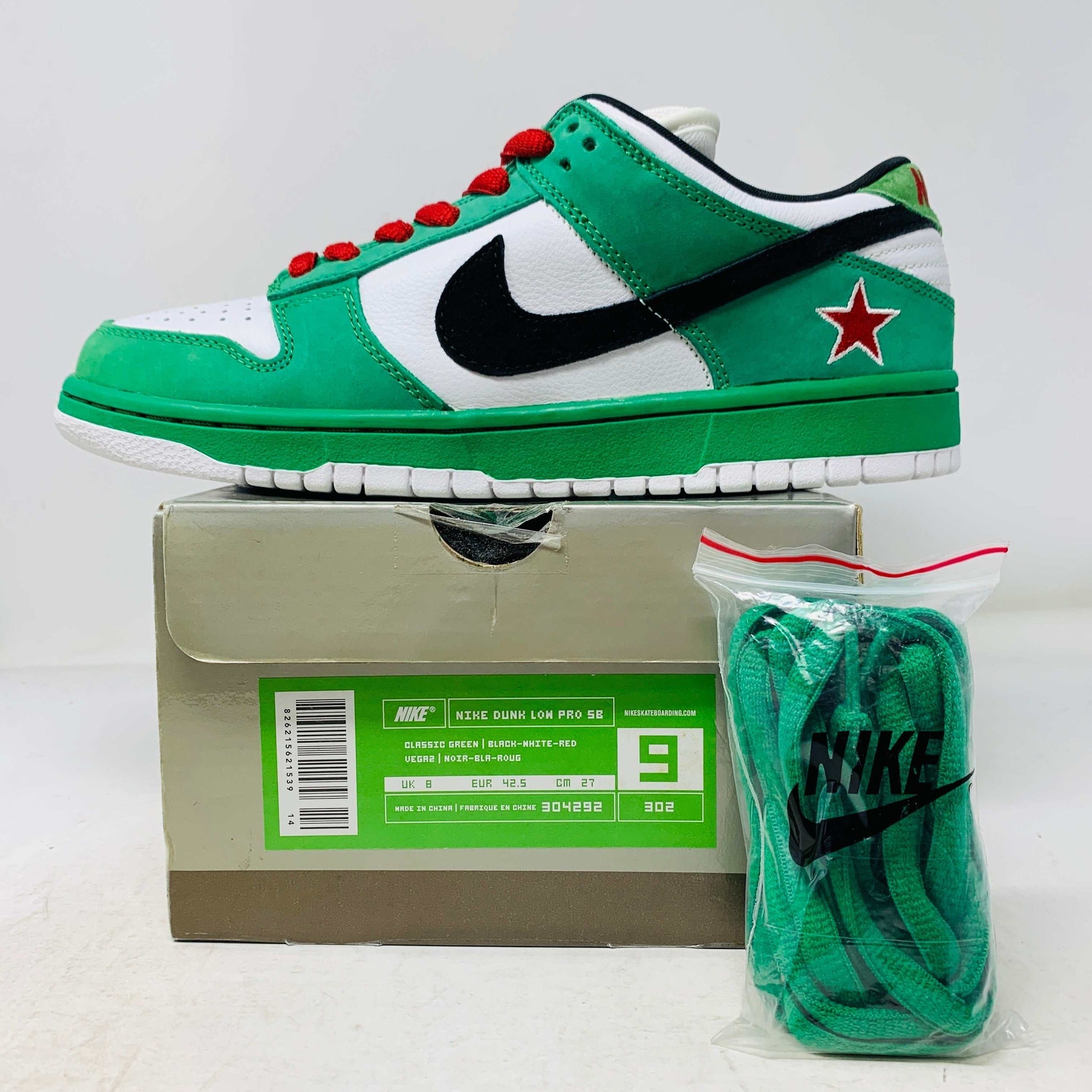 Nike SB Dunk Low Heineken sneakers, size 9M, green laces, brand new condition with popped air units, box in good condition, 2003 edition.