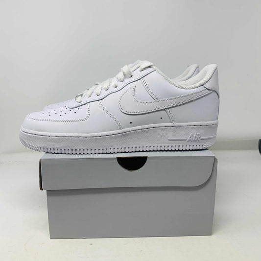 Nike Air Force 1 Low Triple White sneakers, brand new condition, on a shoe box.