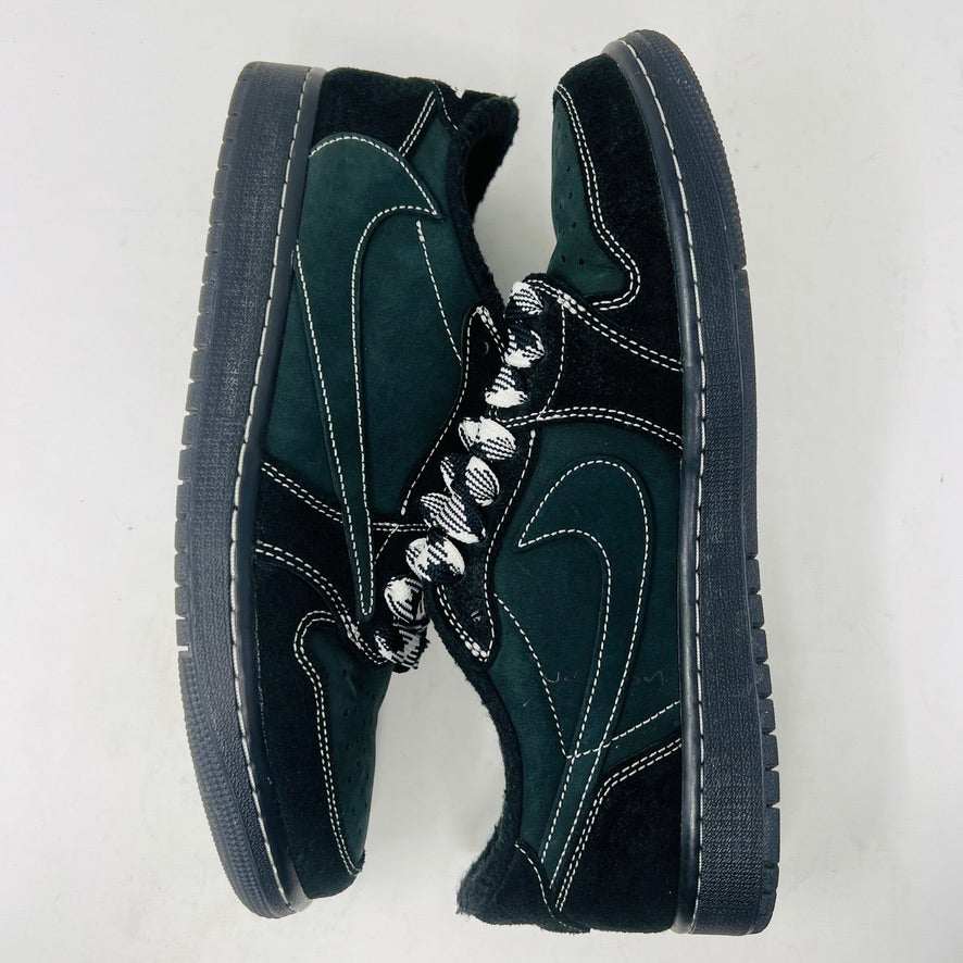 A pair of Jordan 1 Retro Low OG SP Travis Scott Black Phantom sneakers with perforated toe boxes and black and white checkered laces includes extra laces for added style. These authentic Jordans are displayed side by side on a white surface.