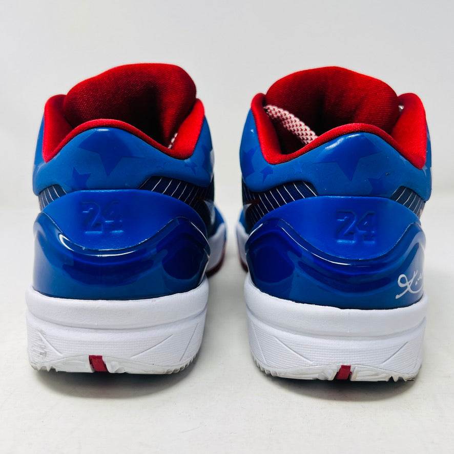 The Nike Kobe 4 Protro Philly (2024), a blue basketball shoe with red and white accents, is displayed on a black shoebox. This authentic piece features a white swoosh, red lining, and size 6.5 tag—ideal for collectors hunting lightly worn treasures for the 2024 courts.