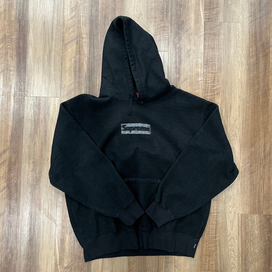 Brand new Supreme Inside Out Box Logo Hooded Sweatshirt SS23 on wooden floor.