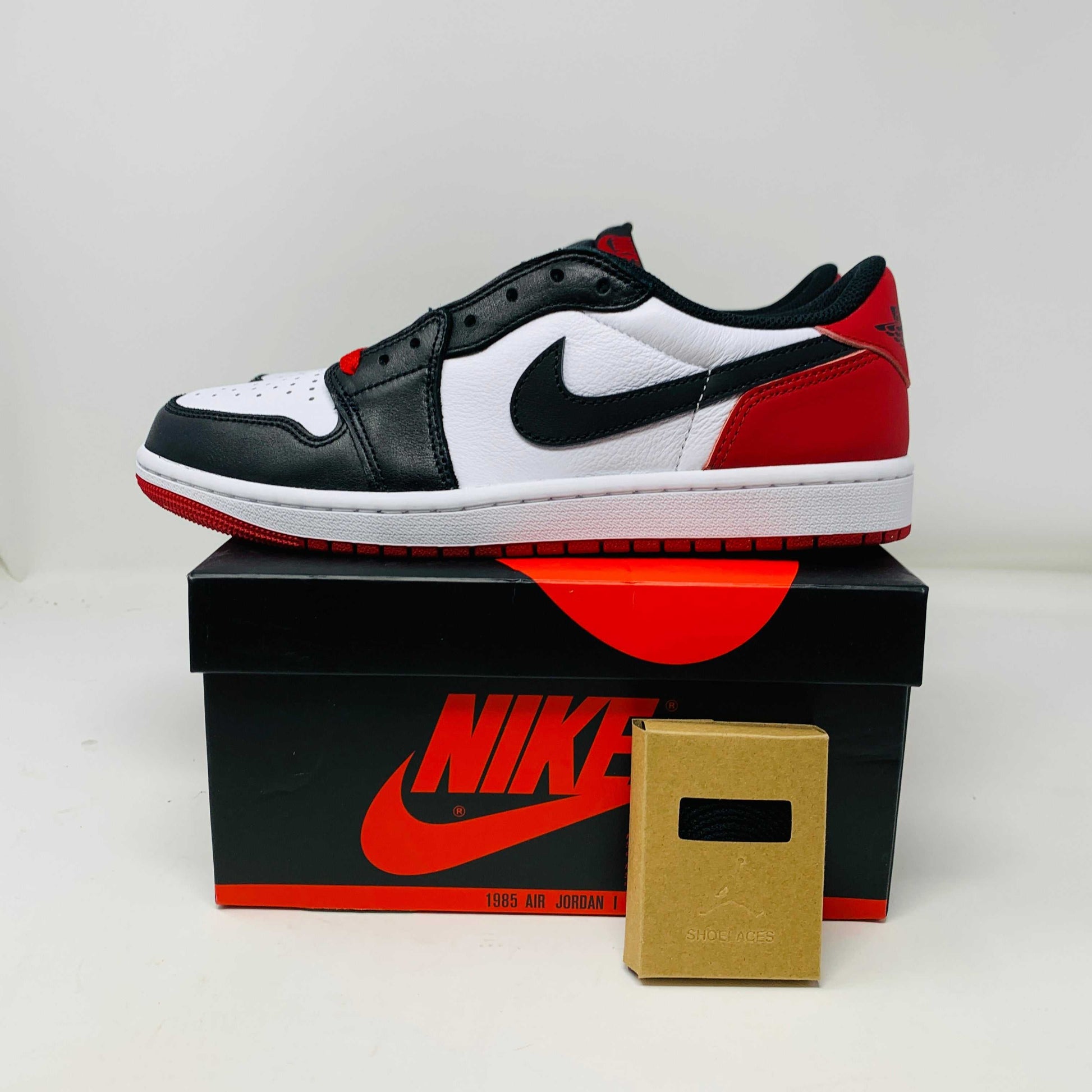 Jordan 1 Retro Low OG Black Toe 2023 sneakers brand new with box and extra laces.