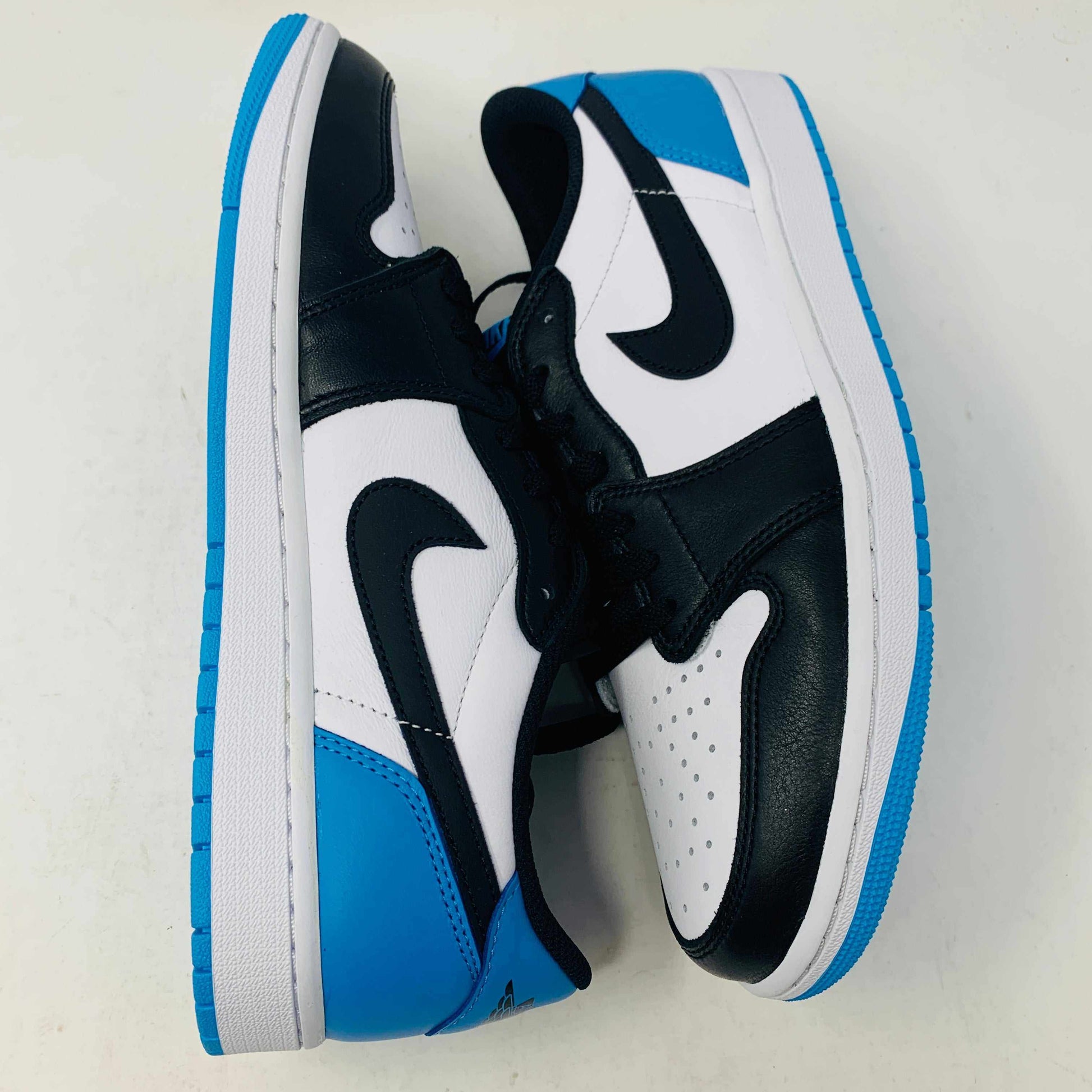 Jordan 1 Low OG Powder Blue sneakers, brand new with extra blue laces, 2022 model.